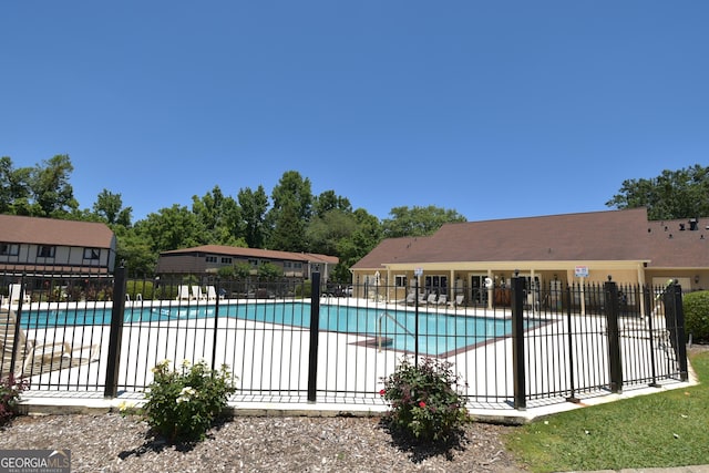 1812 Ashborough Cir SE Unit C, Marietta, GA 30067 - community pool featuring a patio area and fence