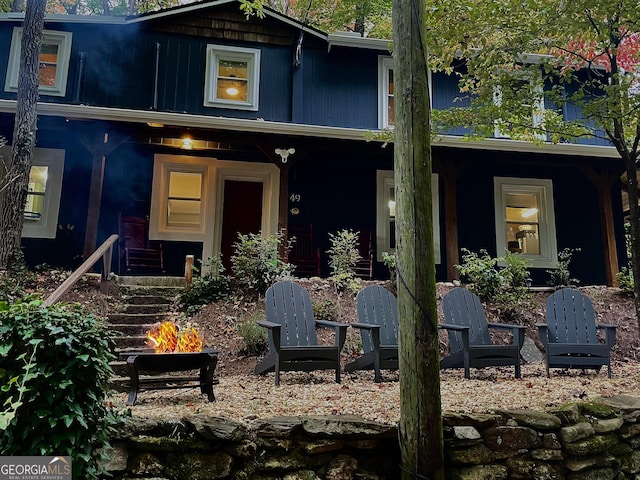 49 Toole St, Clayton, GA 30525 - back of property with a fire pit and a porch