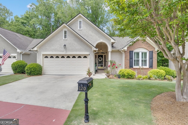 single story home featuring a garage, stucco siding, concrete driveway, and a front lawn