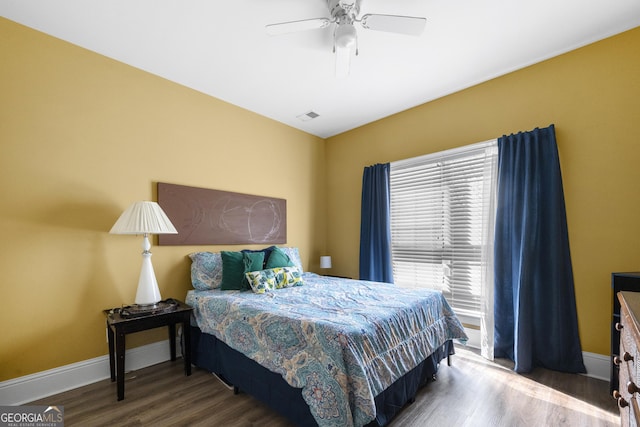 5015 Scuppernong Ct, Austell, GA 30106 - bedroom with visible vents, a ceiling fan, baseboards, and wood finished floors