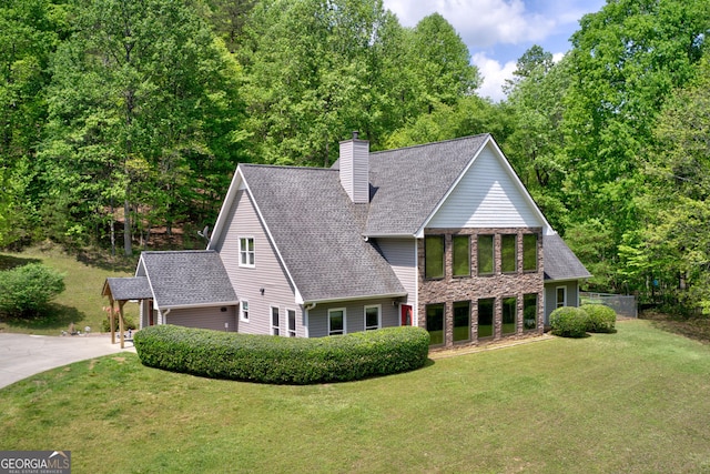 122 Gold View Dr, Dahlonega, GA 30533 - view of front of property featuring a front lawn, a chimney, stone siding, and roof with shingles