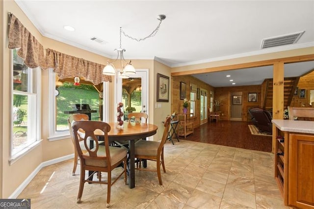 122 Gold View Dr, Dahlonega, GA 30533 - dining area featuring healthy amount of natural light, crown molding, and baseboards