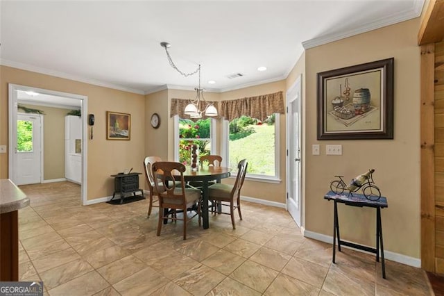 122 Gold View Dr, Dahlonega, GA 30533 - dining area with crown molding, plenty of natural light, a chandelier, and baseboards