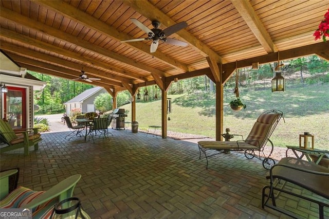 122 Gold View Dr, Dahlonega, GA 30533 - view of patio / terrace featuring ceiling fan, outdoor dining space, and an outbuilding