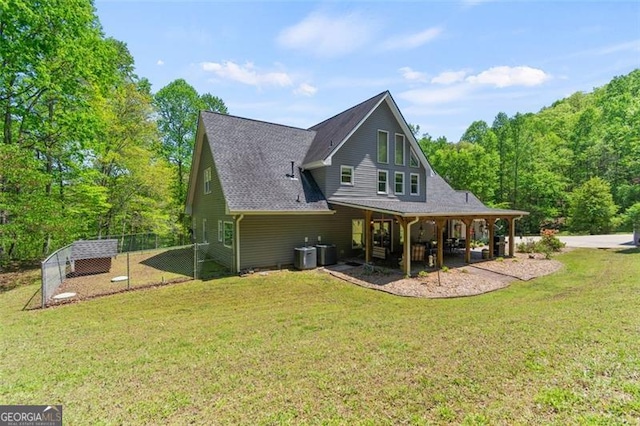 122 Gold View Dr, Dahlonega, GA 30533 - back of property with central AC unit and a shingled roof