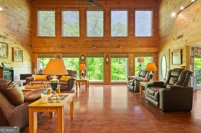 122 Gold View Dr, Dahlonega, GA 30533 - living area with a towering ceiling, wood walls, and wood finished floors