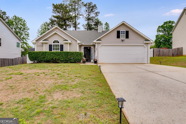 single story home featuring fence, an attached garage, driveway, and a chimney