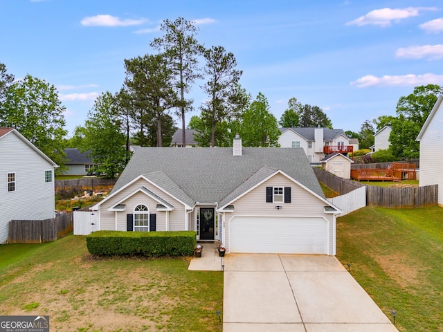 ranch-style home with an attached garage, fence, a front yard, and concrete driveway