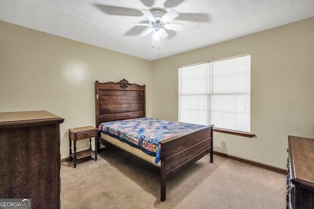 175 Laney Ct, Mcdonough, GA 30252 - bedroom with baseboards, a ceiling fan, and light colored carpet