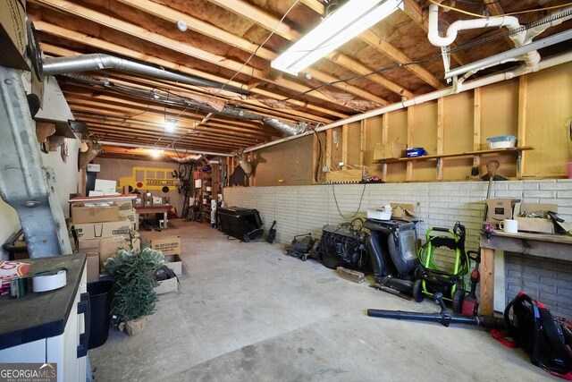 175 Laney Ct, Mcdonough, GA 30252 - unfinished basement with a workshop area