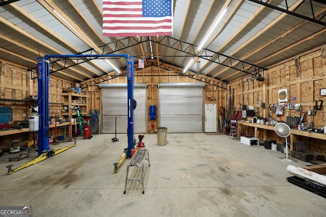 175 Laney Ct, Mcdonough, GA 30252 - garage with a workshop area