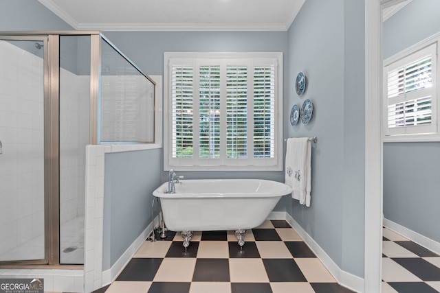 bathroom featuring tile patterned floors, plenty of natural light, and a shower stall