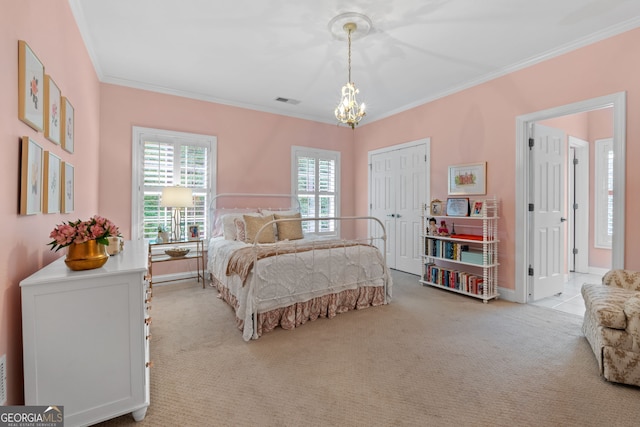 bedroom with visible vents, crown molding, light colored carpet, baseboards, and an inviting chandelier