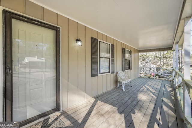 wooden terrace with covered porch