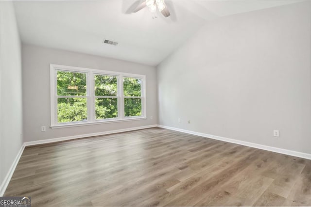 1931 Abinger Way, Lawrenceville, GA 30043 - unfurnished room with visible vents, baseboards, ceiling fan, and wood finished floors