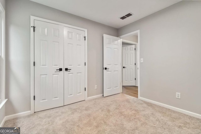1931 Abinger Way, Lawrenceville, GA 30043 - unfurnished bedroom with carpet and a closet