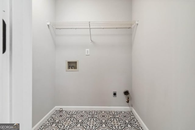 1931 Abinger Way, Lawrenceville, GA 30043 - washroom with laundry area, baseboards, hookup for a washing machine, gas dryer hookup, and hookup for an electric dryer