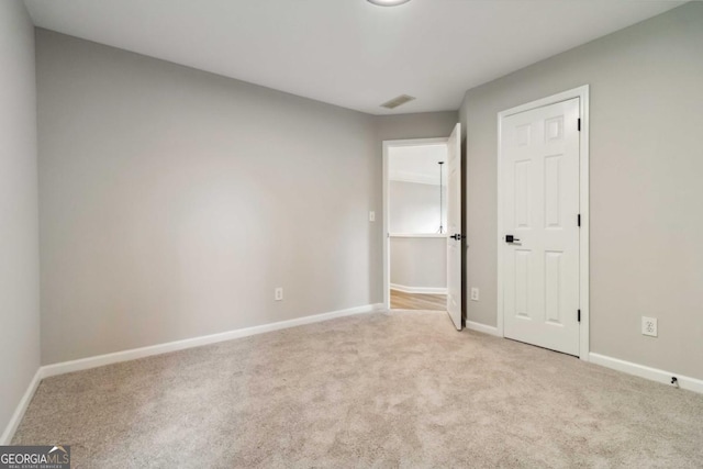 1931 Abinger Way, Lawrenceville, GA 30043 - unfurnished bedroom featuring light carpet