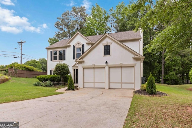 1931 Abinger Way, Lawrenceville, GA 30043 - view of front of house featuring driveway, a shingled roof, a front lawn, and stucco siding