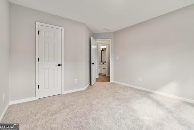 1931 Abinger Way, Lawrenceville, GA 30043 - unfurnished bedroom featuring carpet flooring and baseboards