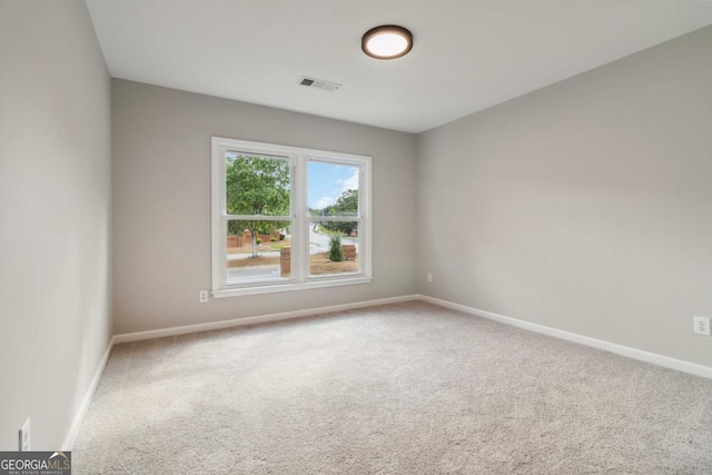 1931 Abinger Way, Lawrenceville, GA 30043 - carpeted empty room featuring baseboards and visible vents