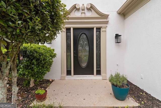 1931 Abinger Way, Lawrenceville, GA 30043 - view of exterior entry featuring stucco siding