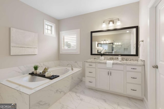 full bathroom with vanity, a stall shower, a bath, and marble finish floor