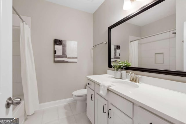 bathroom with tile patterned flooring, vanity, toilet, baseboards, and a shower with curtain