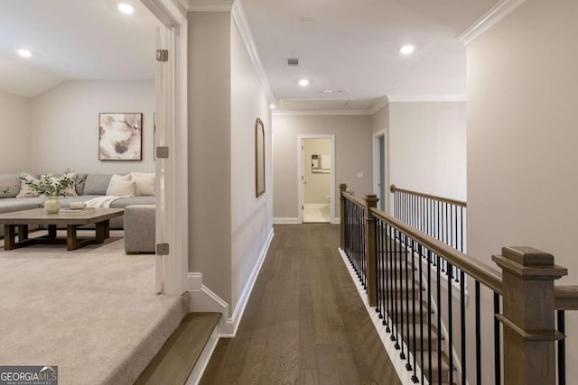 hall featuring recessed lighting, baseboards, ornamental molding, and wood finished floors