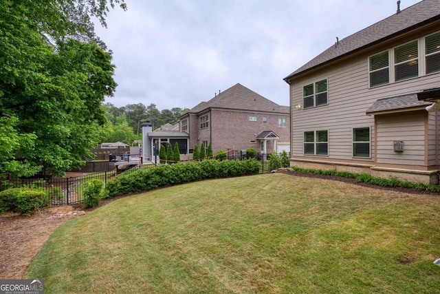 view of yard featuring fence