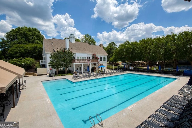 pool with a patio