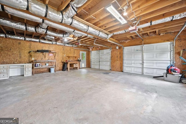 405 Maple Rdg, White, GA 30184 - garage featuring a garage door opener