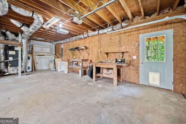 405 Maple Rdg, White, GA 30184 - garage featuring a workshop area and a garage door opener