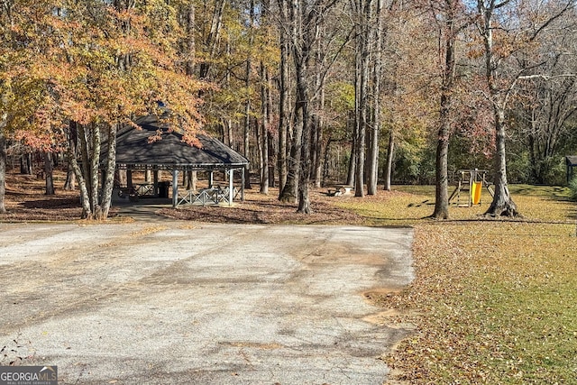 view of yard featuring a playground and a gazebo