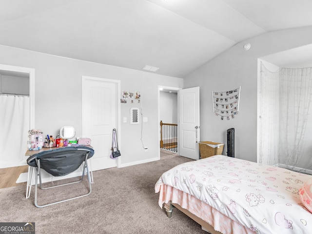 bedroom featuring lofted ceiling