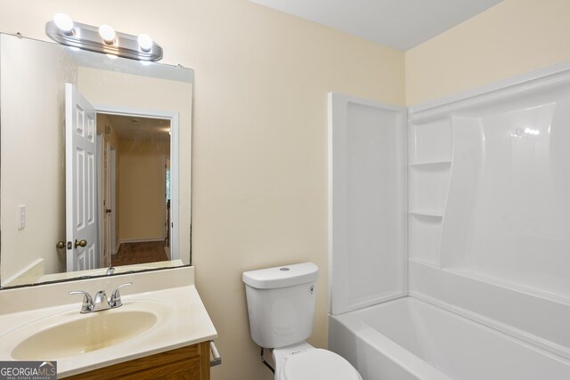 6939 Waters Edge Dr, Stone Mountain, GA 30087 - bathroom with vanity and toilet
