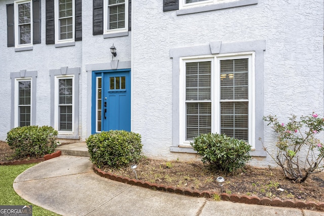 6939 Waters Edge Dr, Stone Mountain, GA 30087 - entrance to property with stucco siding
