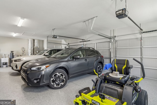 garage featuring a garage door opener