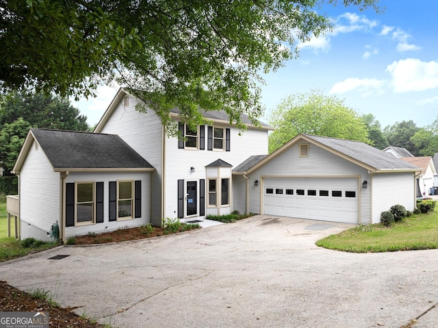 1155 Springway Dr, Gainesville, GA 30501 - view of front facade featuring a garage and concrete driveway