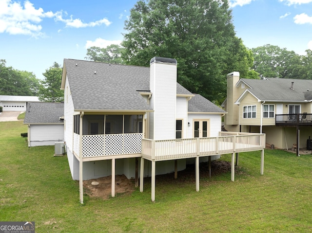 1155 Springway Dr, Gainesville, GA 30501 - rear view of property featuring roof with shingles, a lawn, a deck, a sunroom, and cooling unit
