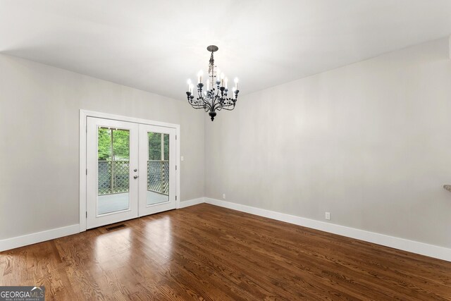 1155 Springway Dr, Gainesville, GA 30501 - unfurnished room with baseboards, visible vents, french doors, and a notable chandelier