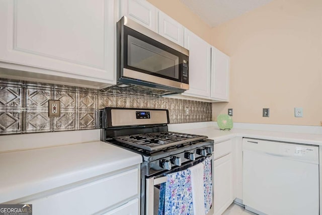 3746 Berkeley Xing, Duluth, GA 30096 - kitchen with backsplash, white cabinetry, appliances with stainless steel finishes, and light countertops