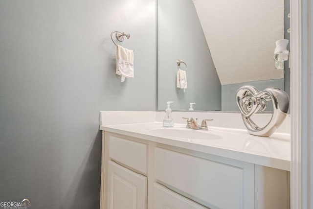 3746 Berkeley Xing, Duluth, GA 30096 - bathroom with lofted ceiling and vanity