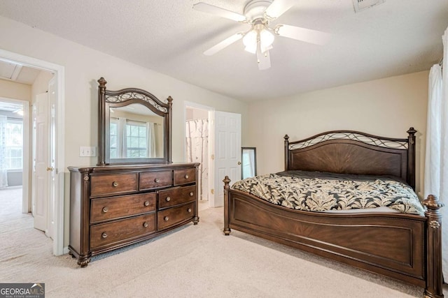 3746 Berkeley Xing, Duluth, GA 30096 - bedroom featuring attic access, a ceiling fan, multiple windows, and light carpet