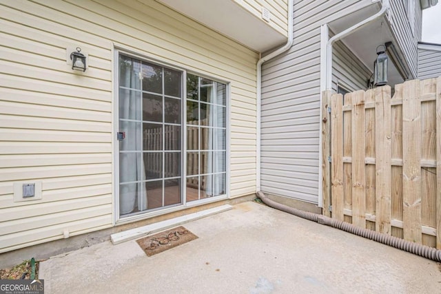 3746 Berkeley Xing, Duluth, GA 30096 - property entrance with fence and a patio area