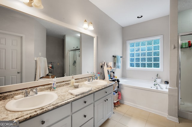 314 Kings Pointe Dr SW, Calhoun, GA 30701 - full bathroom with a sink, double vanity, a shower stall, and a garden tub
