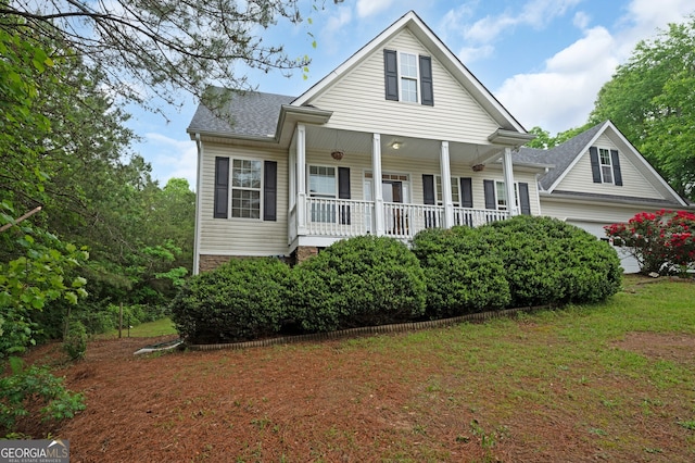 314 Kings Pointe Dr SW, Calhoun, GA 30701 - view of front of property with a garage, covered porch, and a shingled roof