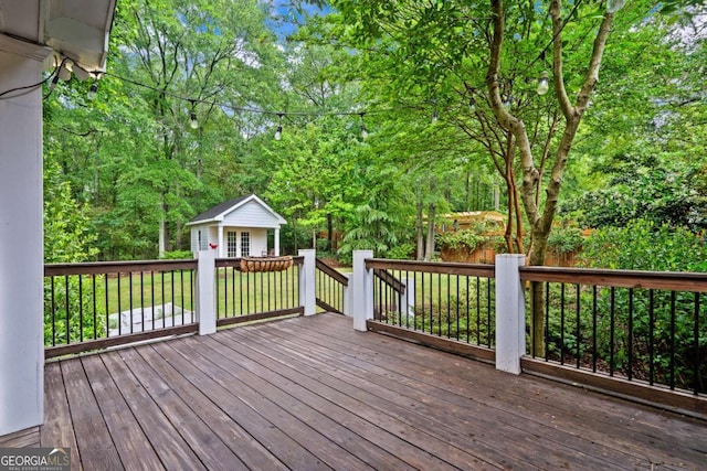 wooden terrace with an outdoor structure