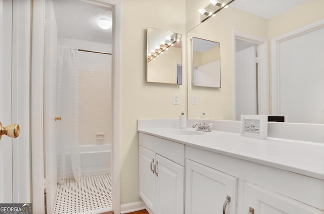 bathroom with vanity and shower / bath combo