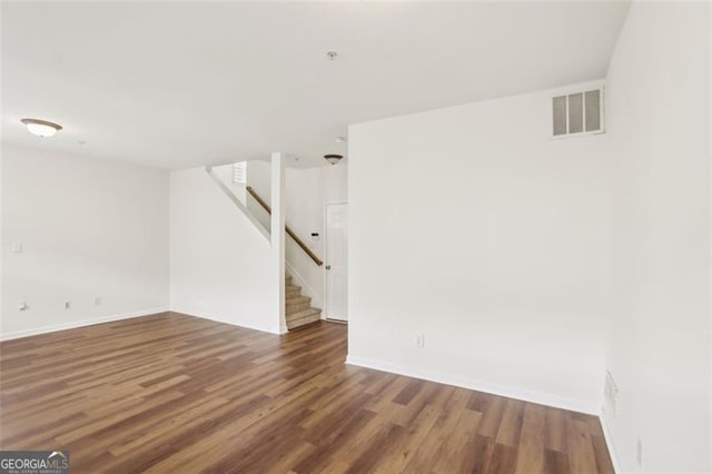 6080 Indian Wood Cir, Mableton, GA 30126 - interior space featuring stairs, baseboards, visible vents, and wood finished floors